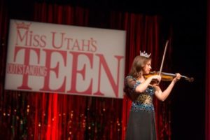 JessiKate Riley performing violin as Miss Utah's Outstanding Teen